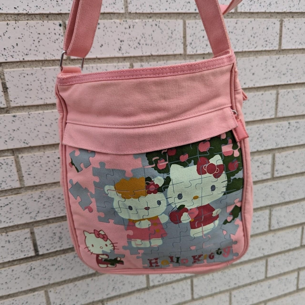 Hello Kitty pink puzzles purse